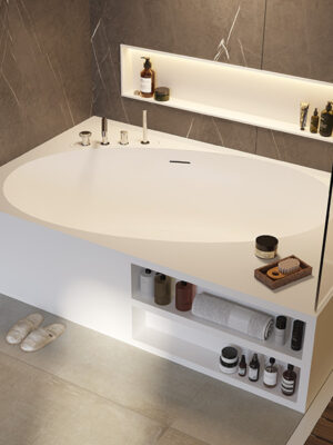 Corner tub in White Stonage model Elisland 20° by MOMA Design with rim-mounted faucets and two-compartment front bookcase, flanked by niche model Container