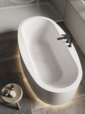 freestanding tub in White Stonage model Olga by MOMA Design, with rim-mounted faucets and LED 3000°K