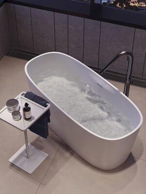 Freestanding tub in White Stonage model Saint Barth by MOMA Design, with Caddy accessory, top view