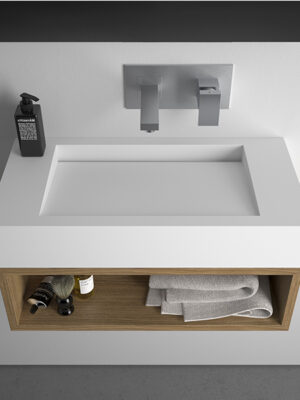lavabo sospeso MOMA Design in Stonage modello Cubatecno 4 con vano a giorno in rovere naturale e scarico invisibile a taglio