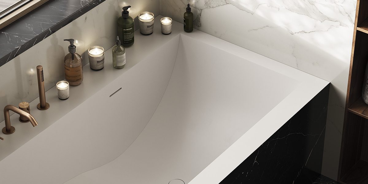copertina2-jade-inca-vasca-da-incasso-in-white-stonage dettaglio vasca da bagno MOMA Design modello Jade inca con parete in gres