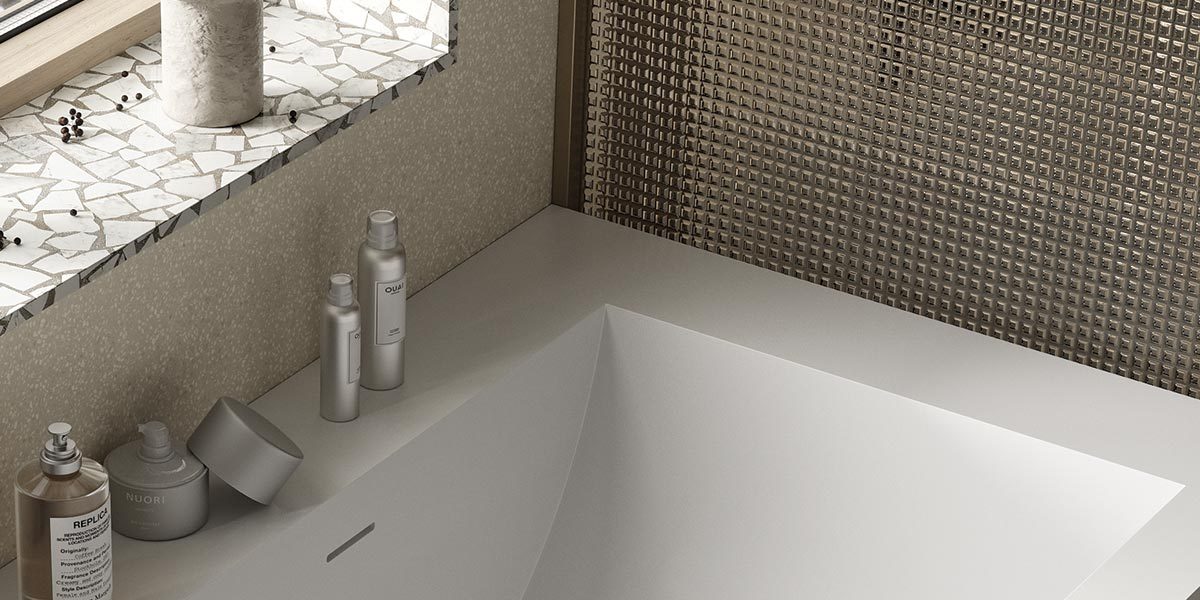 copertina2-jade-vasca-squadrata-customizzabile-in-white-stonage zoom vasca ad angolo MOMA Design in Stonage, modello Jade con invaso ergonomico e rubinetteria a bordo vasca