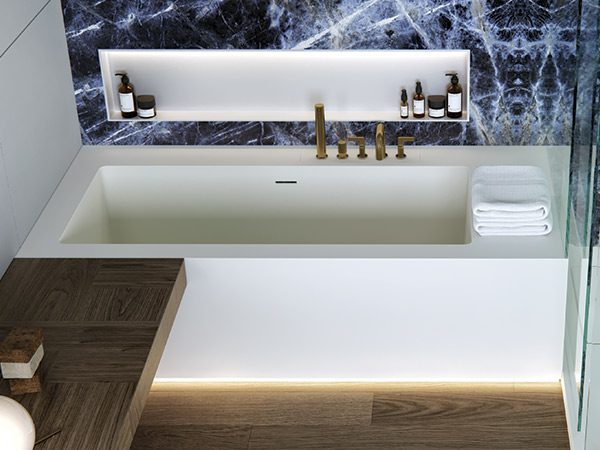 dettaglio-crystal-vasca-squadrata-customizzabile-in-white-stonage vasca ad angolo MOMA Design in Stonage, modello Crystal senza schienali, rubinetteria a bordo vasca e nicchia Container e LED