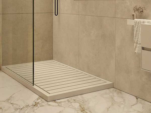 dettaglio-one-shower-piatto-doccia-in-white-stonage piatto doccia ad angolo MOMA Design modello One Shower con doghe in Corian e nicchia illuminata modello Container, affiancata a lavabo modello Cubic