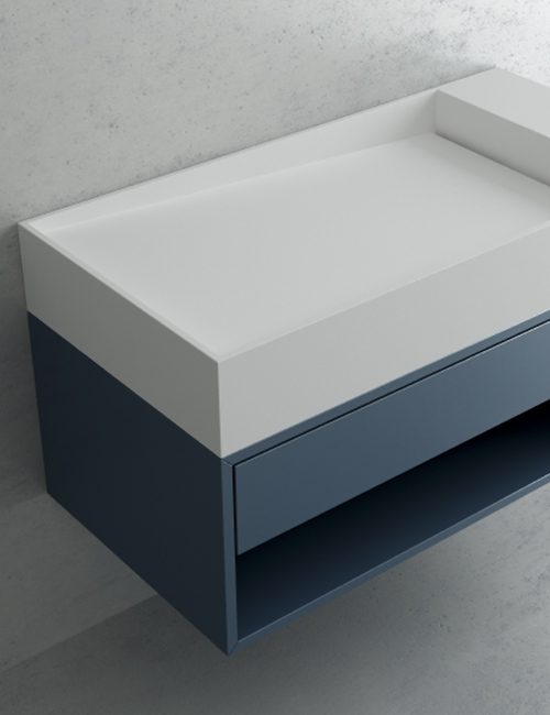 dettaglio2-cubic-xs4-lavabo-sospeso-in-white-stonage dettaglio mobile-lavabo sospeso MOMA design in Stonage con vano a giorno e cassetto in MDF laccato petrolio, modello Cubic XS 4