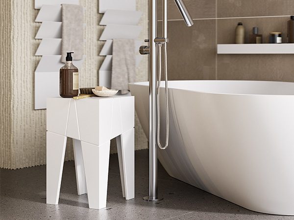 tangram stool in white stonage -dettaglio2 sgabello MOMA Design modello tangram stool in white stonage affiancato a vasca da bagno modello Ocean